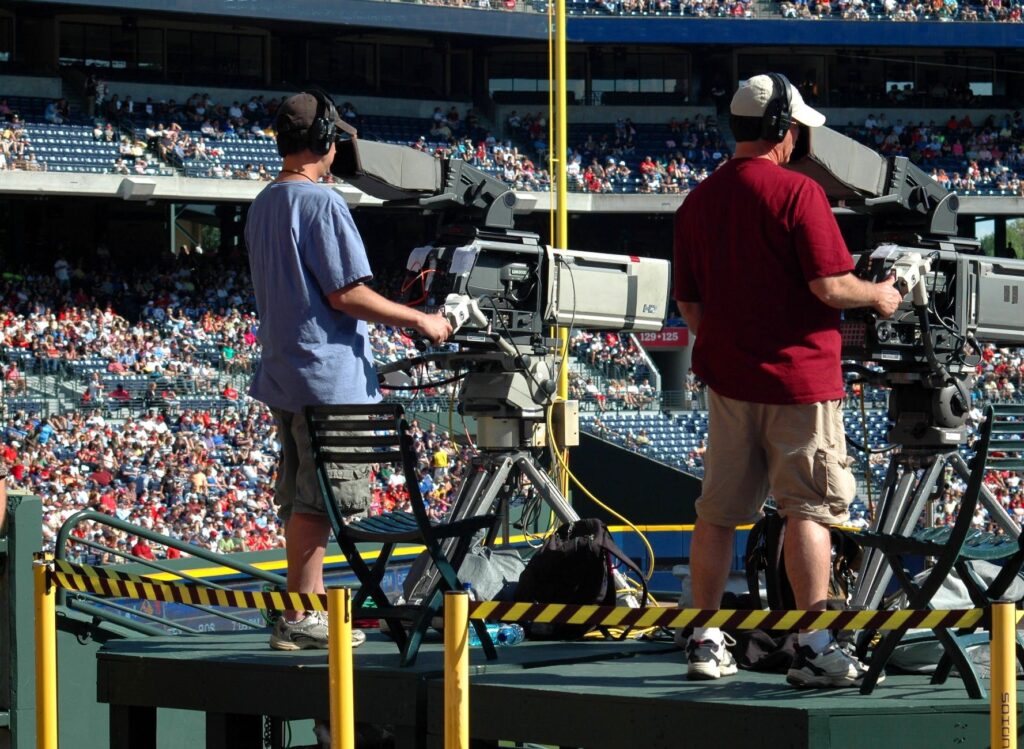 television-camera-men-outdoors-ballgame-159400.jpeg