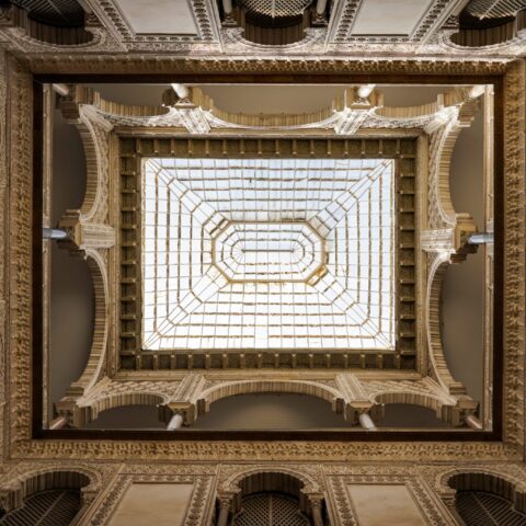 Down to top view of one of the skylights at Alcázar of Seville, historic royal palace in Spain