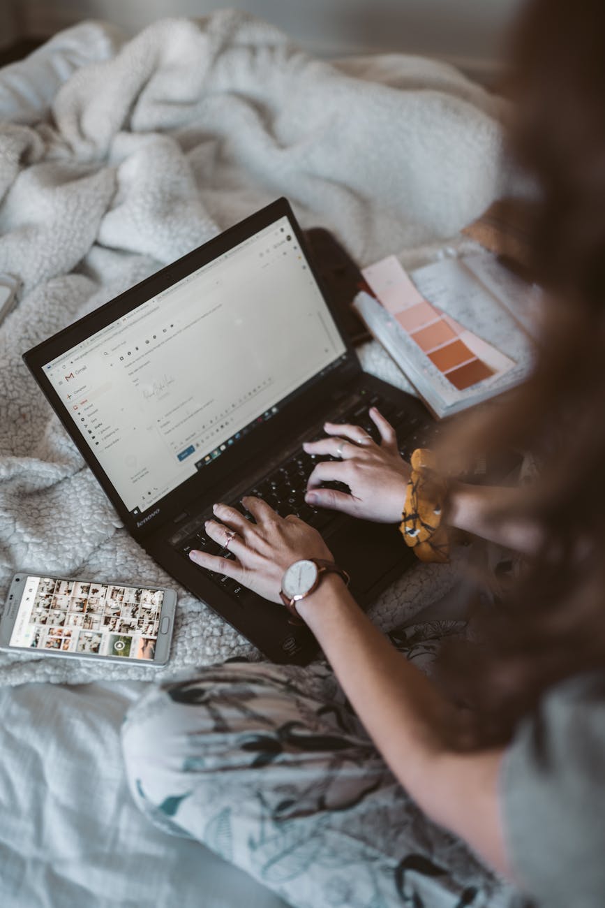 photo of person using black laptop